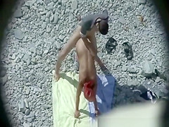 Horny couple in the beach having sex