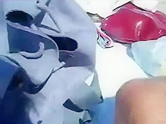 Kinky couple filming their beach fuck