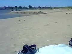 Kinky couple filming their beach fuck