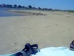 Kinky couple filming their beach fuck