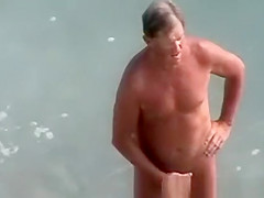 Licking pussy at beach