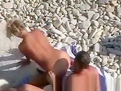 Mature Couple Playing on Beach