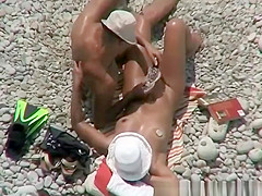 Nudist woman fingered at beach