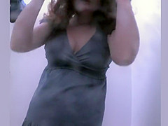 Mature lady showers in a beach cabin