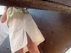 Mature lady wipes her pussy in a cabin