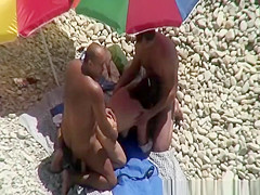 Threesome in nudist beach
