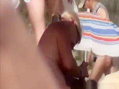 Nudist wives giving their men handjobs