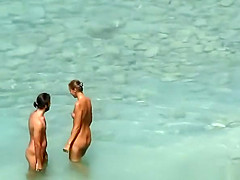 Nudist woman blows cock in beach