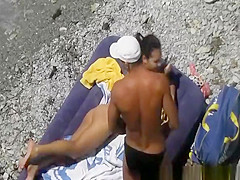 Nudist fucked in air mattress in beach