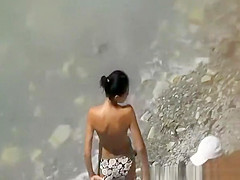 Nudist fucked in air mattress in beach