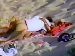 Voyeur watched a hot fuck on the sand