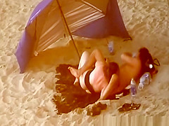 Chubby woman blows cock in the beach