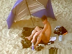 Chubby woman blows cock in the beach