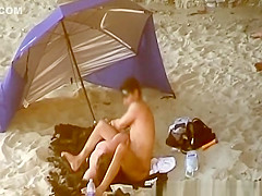 Chubby woman blows cock in the beach