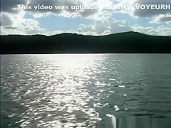 Cute nudists on a beach boat trip