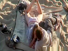 Teen couple oral sex on the beach