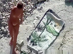 Couple fucking in the water and shore