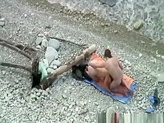 Couple fucking in the beach