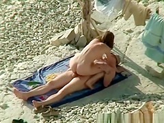 Nude couple caught fuking in beach