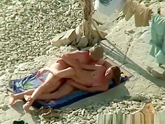Nude couple caught fuking in beach