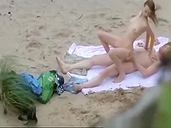Couple on Beach Voyeur