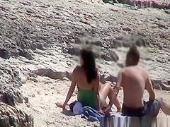 Couple spied fucking in rocky beach