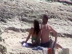 Couple spied fucking in rocky beach