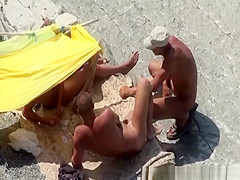 Nudist couples fucking in rocky beach