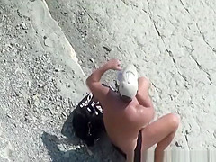 Nudist couples fucking in rocky beach