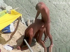 Nudist couples fucking in rocky beach