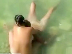 Couple spied on beach voyeur