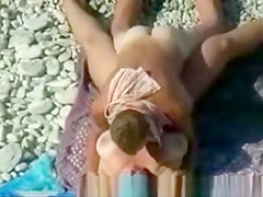 Couple spied on beach voyeur