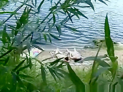Couple fucking in the river beach
