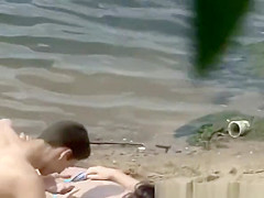 Couple fucking in the river beach