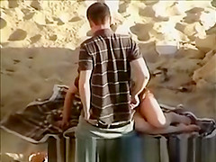 Couple caught on the beach
