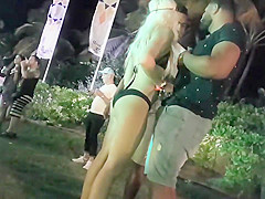 Slutty blonde flirts with a black guy