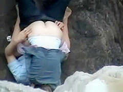 Lovers on Rocky Beach