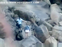 Lovers on Rocky Beach