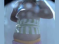 Peeping a chubby girl dressing a bikini
