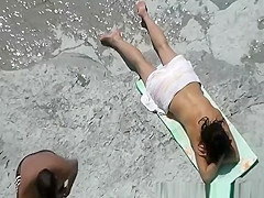 Horny nudist riding cock in beach