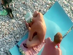 Nudist couple fucking in rocky beach