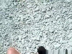 Blowjon in rocky beach