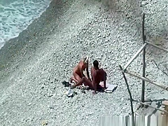 Blowjon in rocky beach