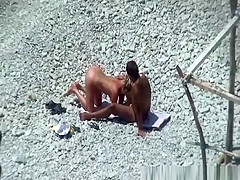 Blowjon in rocky beach