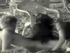 Teen couple having sex on the beach