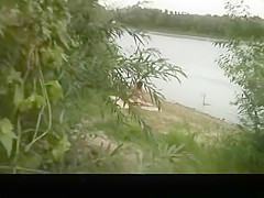 Horny couple in river beach shore caught fucking