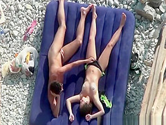 Pussy fingering and blowjob at rocky beach