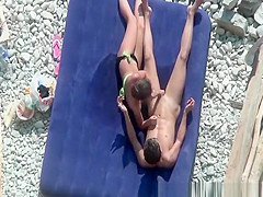 Pussy fingering and blowjob at rocky beach