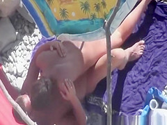 Nudist woman gives her man an hand