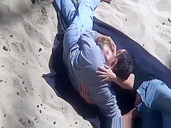 Couple spied having sex in the beach